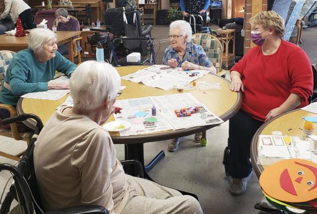 Working on the tree craft. L-r: Marty Boyer, Marlene Dykes, Nadene Andersen and Vicky Earl.