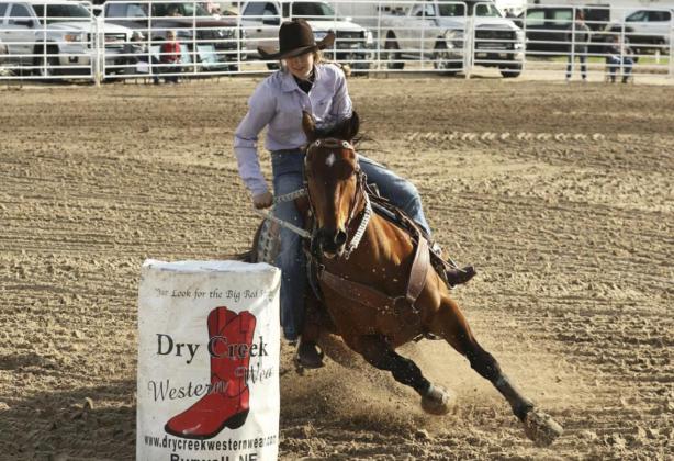 Whitney Jennings competes in the barrels at Burwell on May 8. Jill Saults