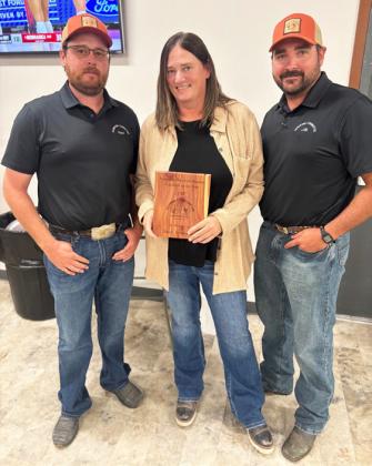 Volunteer of the Year Kelly Marsh with committee members Shane Carr and JW Schmid. courtesy photos
