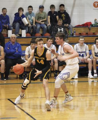Jaden Emerson dribbles around a defender at Hyannis. Jill Coble