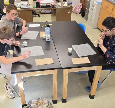 The Mullen 6th graders are learning about weather in science. They are exploring the properties of water and how it interacts in the atmosphere to create clouds and storms. Pictured are Cooper Cash, Bronx Burney and Pandora Gray. Tawn Jewell
