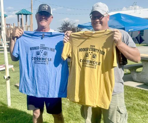 Phil Hoyt (left) and Mike Kvanvig were the winners of the Cornhole Tournament held last Friday afternoon, Aug. 2. Carolee Brown