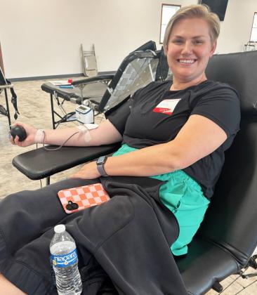 Pictured is Emily Brown donating blood last week.