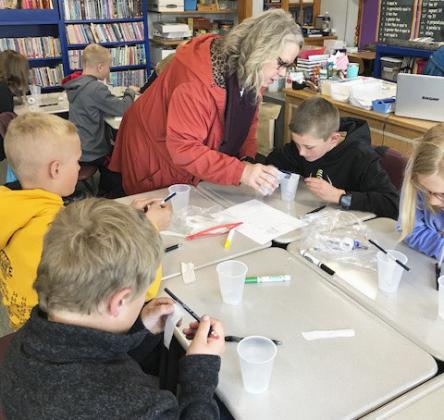 Anna Baum in the 4th grade classroom. courtesy photos