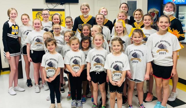 Mini Broncos perform at halftime