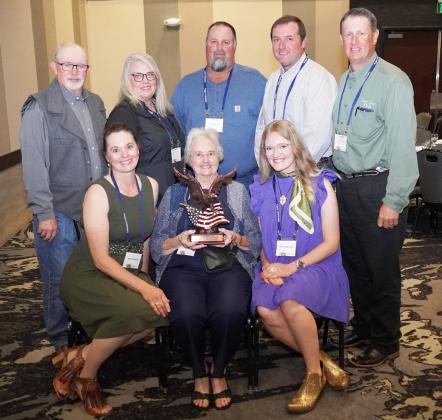 Back, l-r: NARD President Martin Graff, ULNRD General Manager Anna Baum, Larry Ridenour, Ryan Ridenour, ULNRD Director Chris Higgins. Front: Susan Sjeklocha, Judy Ridenour, Rebel Sjeklocha. NRD