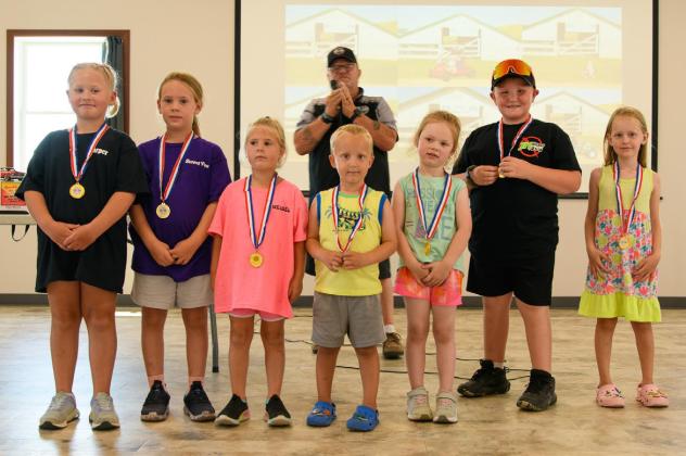 Youth participants at the show are pictured l-r: Harper Myers, Kinley Crisp, Kyla Crisp, Arthur Polt, Sloane Kroll, Lane Brown and Aurora Polt. Not pictured: Kybrienne Crisp.