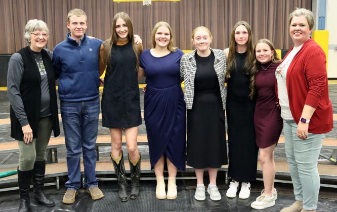 In her third year as the (K-8) music teacher, Mary Jo Walker also now has a high school choir class. The choir sang five songs at the Christmas Concert held at the Lariat last Tuesday, Dec. 2. They are pictured afterwards, l-r: Mary Lou Harding (piano accompanist), Hayden Morrison, Abigail Gracey, Maci Walz, Kassidy Cheever, Breckyn Burney, Audrabell Werth, Mary Jo Walker.