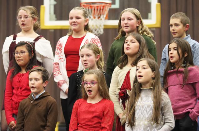 Some of the 4th and 5th graders performing last Tuesday evening, back l-r: Taylor Cash, Ella Walz, Tatum Deibler, Grady Phipps. Middle: Natalee Walker, Marki Finney, Zandra Hebbert, Finley Mundorf. Front: Holt Morrison, Anna Hessin, Avery Pollard.