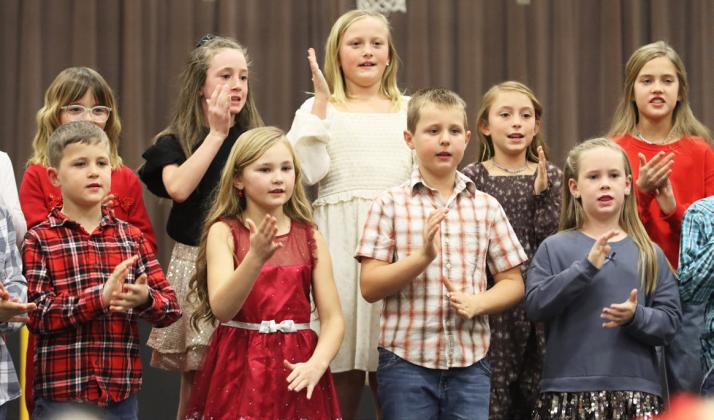 Some of the 2nd and 3rd graders performing at the Christmas Concert, back l-r: Nora Pohot, Dailie Dent, Danielle Peterson, Bryndal Greeley, Madelyn Seeley. Front: Tate Phillips, Brogan Jewell, Kayden Evans, Kinley Crisp.