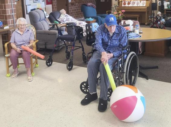Bob Osterman, Minnie Mary Hamilton, Nadene Andersen and Richard Broyles playing noodle ball.