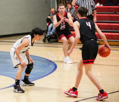 Nicholas Gonzalez on defense against Anselmo-Merna. Megan Andersen
