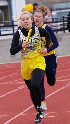 Taylor Svoboda runs her leg of the 4x800 relay, which the Lady Broncos claimed the gold medal in at Paxton. Barb McIntosh