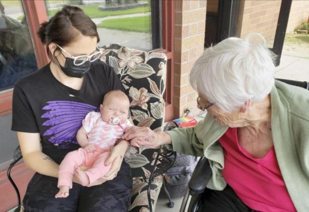 Katie Dailey and baby Ophelia came and visited! She’s so cute and as you can tell, the residents enjoyed seeing them! Pictured is Marlene Dykes.