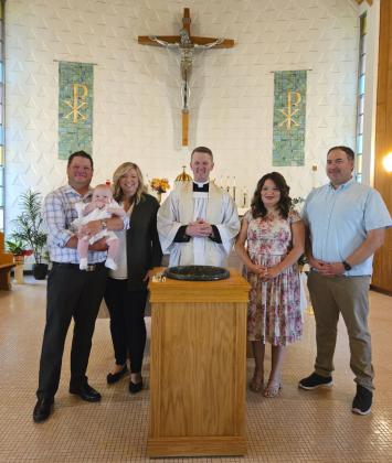 Calvin David Sullivan was baptized by Fr. Matthew Nash on Aug. 12, 2023, at St. Mary’s Church. Pictured l-r: Patrick, Calvin and Melissa Sullivan, Fr. Matthew Nash, godparents Alana Sullivan and Justin Brei. Catherine Sullivan