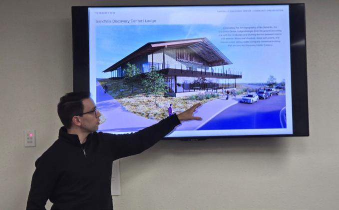 Ryan Hier shows the lodge proposed for the Sandhills Discovery Center. Terri Licking