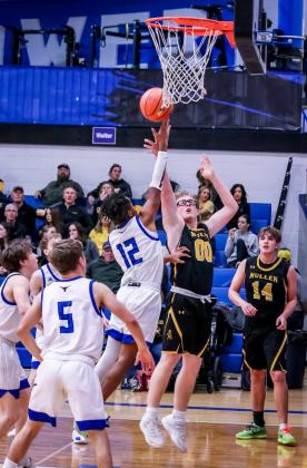 Daniel Wright puts up a shot at Hyannis. Carolee Brown Photography