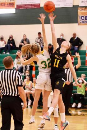 Samantha Moore reaches for the ball during tipoff of the Lady Broncos’ game at North Platte St. Pat’s last Tuesday. Sue Licking