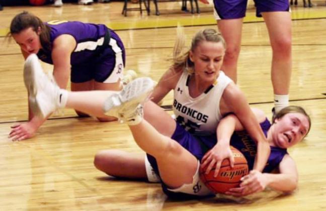 Brooke McCully fights for a lose ball against Bridgeport. Sue Licking