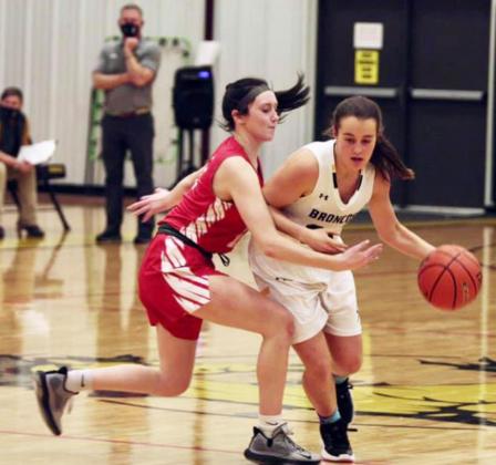 Callie Coble dribbles around a defender against Brady last Friday. Sue Licking