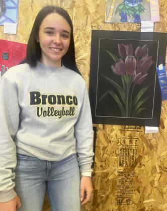 Bella Brown with her 1st place chalk drawing.