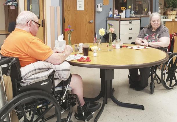 Stan Boyer and Ann Connell playing Bingo.