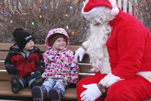 Aiden and Violet Stichka visit with Santa. Gerri Peterson
