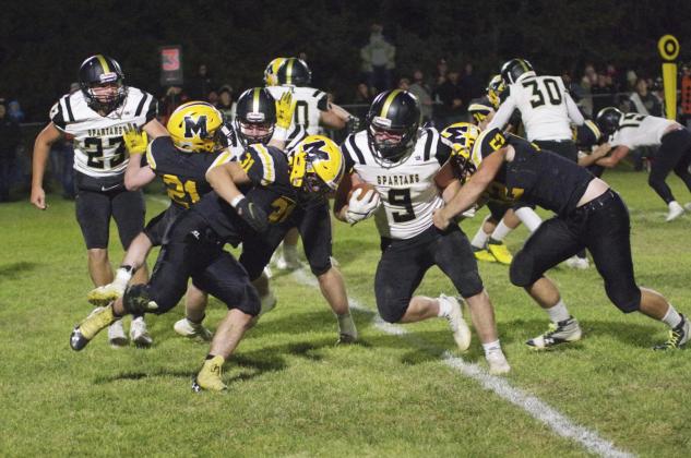 #31 Spencer DeNaeyer and #52 Adam Wiens on defense last week against Ansely-Litchfield. Pam Ginkens