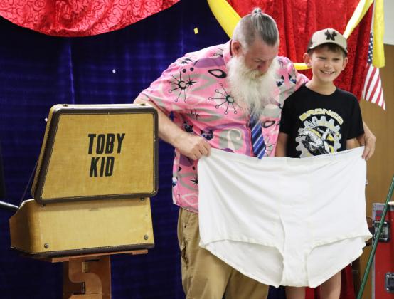 Cooper Phillips helped Toby turn a cloth into some BIG underwear.