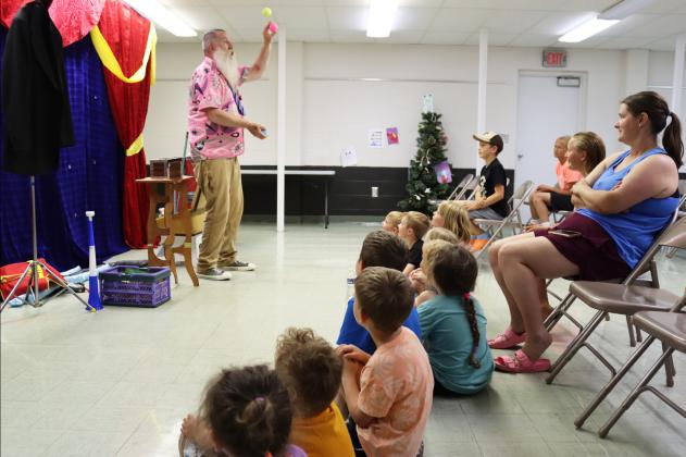 Toby KID entertains at library