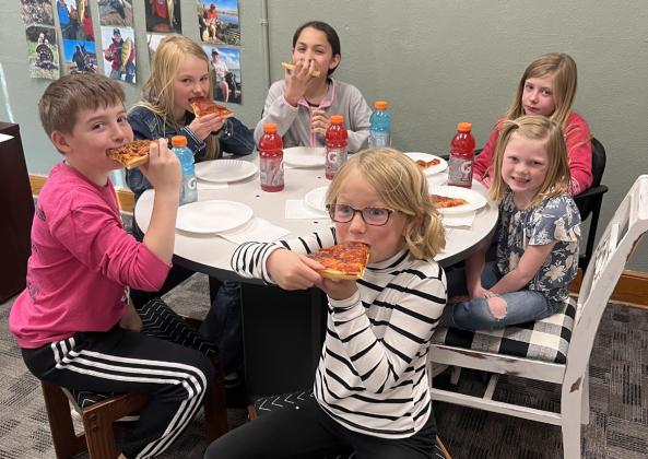 Pictured clockwise around the table from the left: Zach Hicks, Ayden Lee, Luciana Gonzalez, Marki Finney, Meyer Vinton, Fallon Lee. Brett Mauler