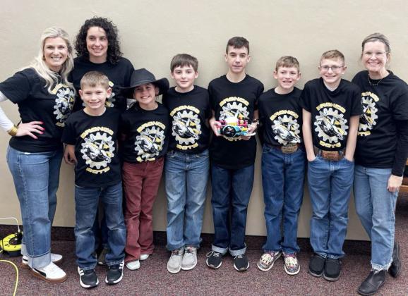 L-r: Coach Tami Miller, Coach Becky Mundorf, Cooper Phillips, Finley Mundorf, Zach Hicks, Brandt Mundorf, Duke Miller, Oakes Miller, Coach Heather Phillips. courtesy photo