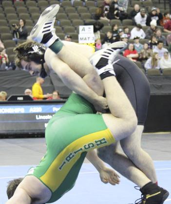 Senior Tel Kvanvig competing at State Wrestling on Friday.