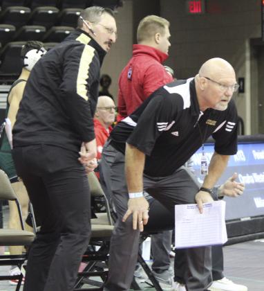 Coaches Bo Pettit and Russ Monette intent on a Bronco match.