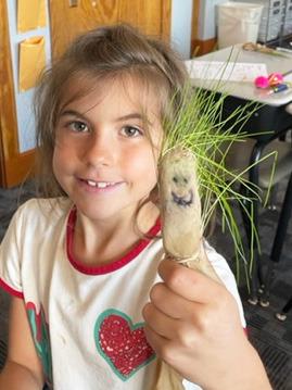 2nd graders grow Grass Heads