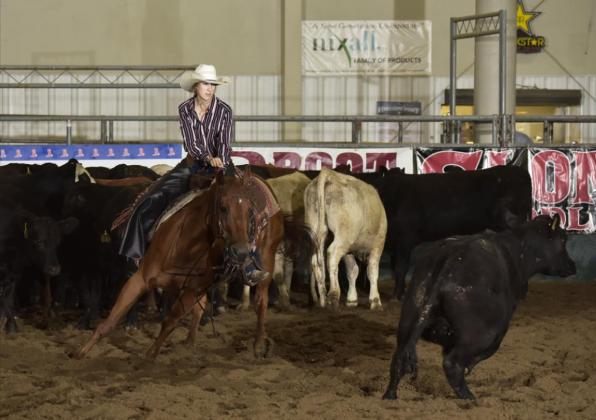Whitney Jennings competing in girls cutting at Nationals. Acentric Rodeo
