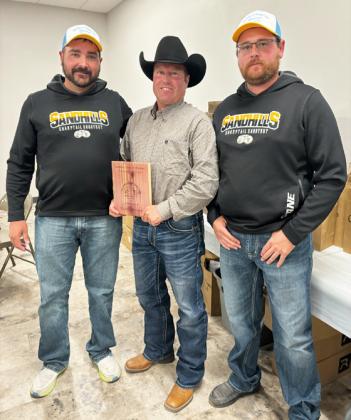Volunteer of the Year Jay Lovitt with committee members JW Schmid (left) and Shane Carr.