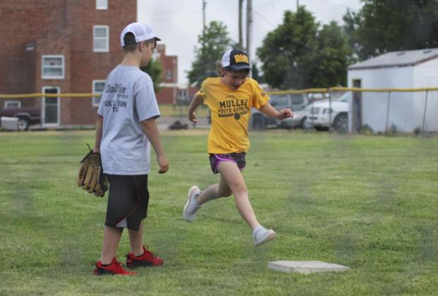 Logan Moore makes it to third base