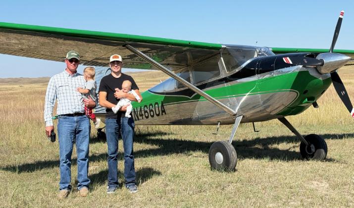 Jed Connealy won the spot landing. He is pictured with sons Archer, Cian and Teddy.