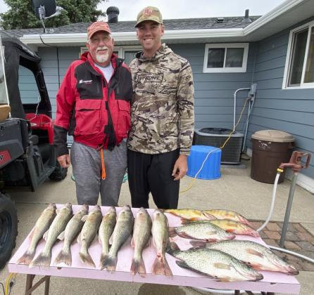 Chuck Anders and his grandson Colton Micheel after a good day of fishing this spring.