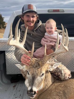 Saige Marshall seems just as pleased with her dad Teven’s deer as he is!