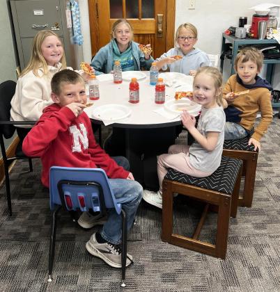 Pictured around the table from front left: Luke Cox, Tatum Deibler, Kendall Phipps, Fallon Lee, Austin Smith, Aurora Polt. Brett Mauler