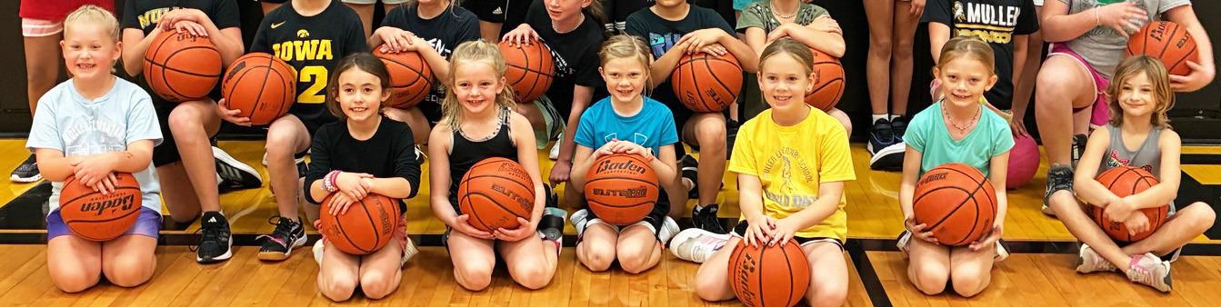 The 1st &amp; 2nd grade girls wrapped up their basketball season last week, showing off their skills at halftime of a varsity game. Pictured at a practice earlier in the year, l-r: Harper Myers, Addison Mundorf, Ryann Walz, Meyer Vinton, Kinley Crisp, Brystol Call, Ryhme Pettit.