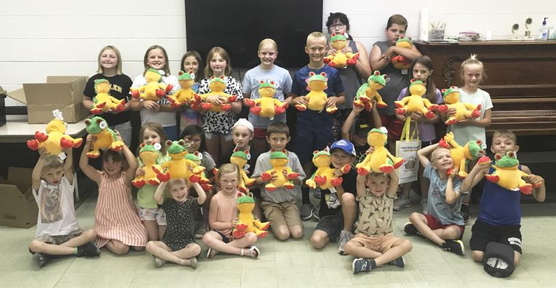 The Summer Reading Program, “All Together Now” was held at the Hooker County Library on June 8. Pictured with the frogs they made got to take home with them, back l-r: Tatum Deibler, Ella Walz, Lillian Ericksen, Elle Gracey, Ava Walz, Teal Peterson, Pandora Gray, Hunter Gray, Keira Kearns, Danielle Peterson. Front: Merick Lattin, Aislynn Connealy, Eve Ericksen, Aurora Polt, Natalee Walker, Meyer Vinton, Avery Vinton, Marcus Lattin, Cooper Phillips, Kayden Evans, Tate Phillips, Killian Kearns, Jaxyn Evans.