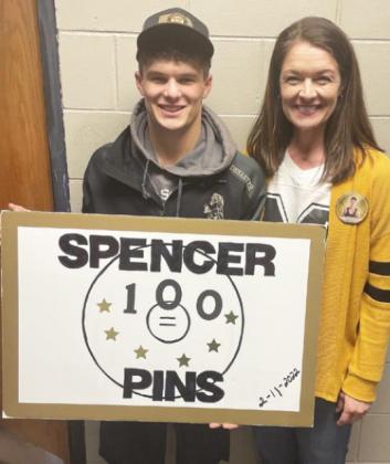 Spencer DeNaeyer, pictured with his mom, Bree, earned his 100th pin at Districts. courtesy photo