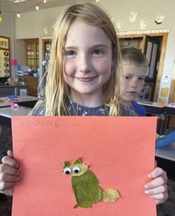 Ryden Ourada and Elle Gracey with a few of the leaf animals made.