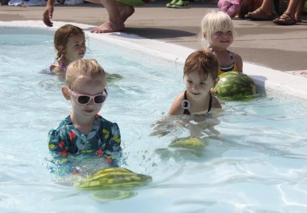 L-r: Aurora Polt, Addison Mundorf, Ryhme Pettit and Violet Stichka in the 0-3 Baby Pool Watermelon Race. Gerri Peterson