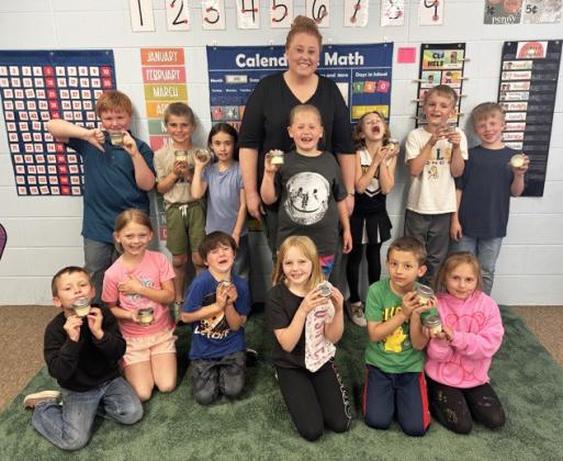 The first graders are pictured with their butter, back l-r: Lane Brown, Brogan Seeley, Addison Mundorf, Mrs. Myers, Harper Myers, Ryhme Pettit, Cooper Peers, Finnegan Connealy. Front: Wyatt Greeley, Brystol Call, Wesley Simmons, Ryann Walz, Austin Smith, Doris Boland. courtesy photo