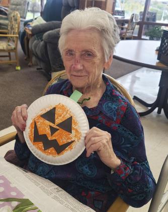 Wanda Mackley with our pumpkin craft.