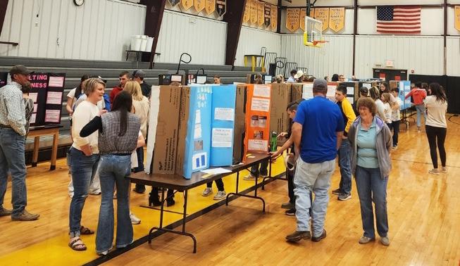 The Middle School Science Fair was held on Tuesday, March 19 at the Hilltop Gym. The students put a lot of time and effort into their projects. They were judged during the afternoon, with the fair then open to the public that evening. The Judge's Pick was 8th grader Ben Werner and the Top Overall Score went to 7th grader Abigail Gracey. Tawn Jewell
